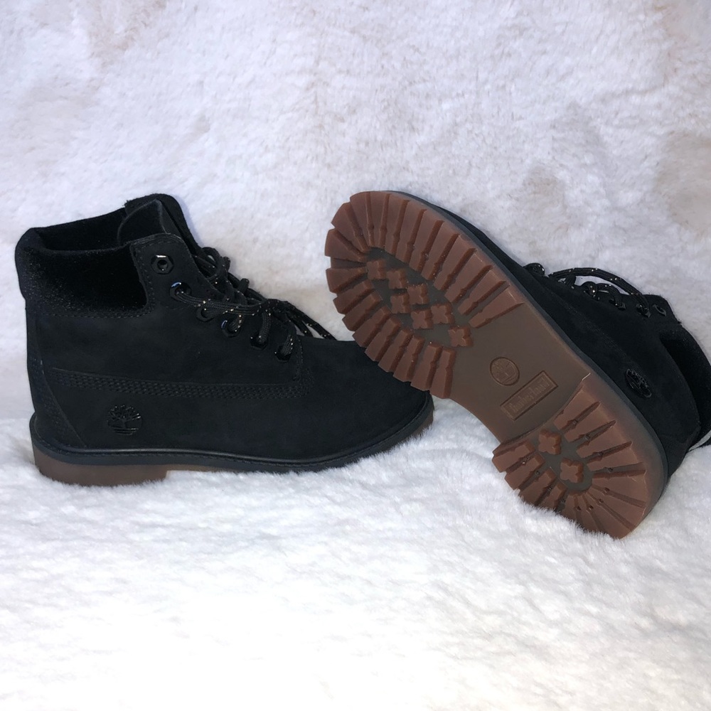 Black waterproof timberland boots.